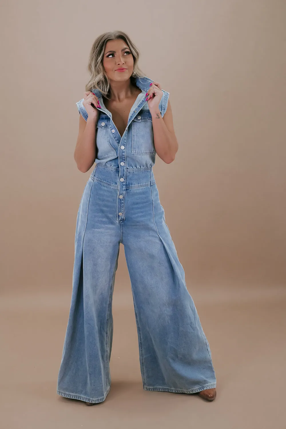 Doing The Most Denim Button Up Jumpsuit