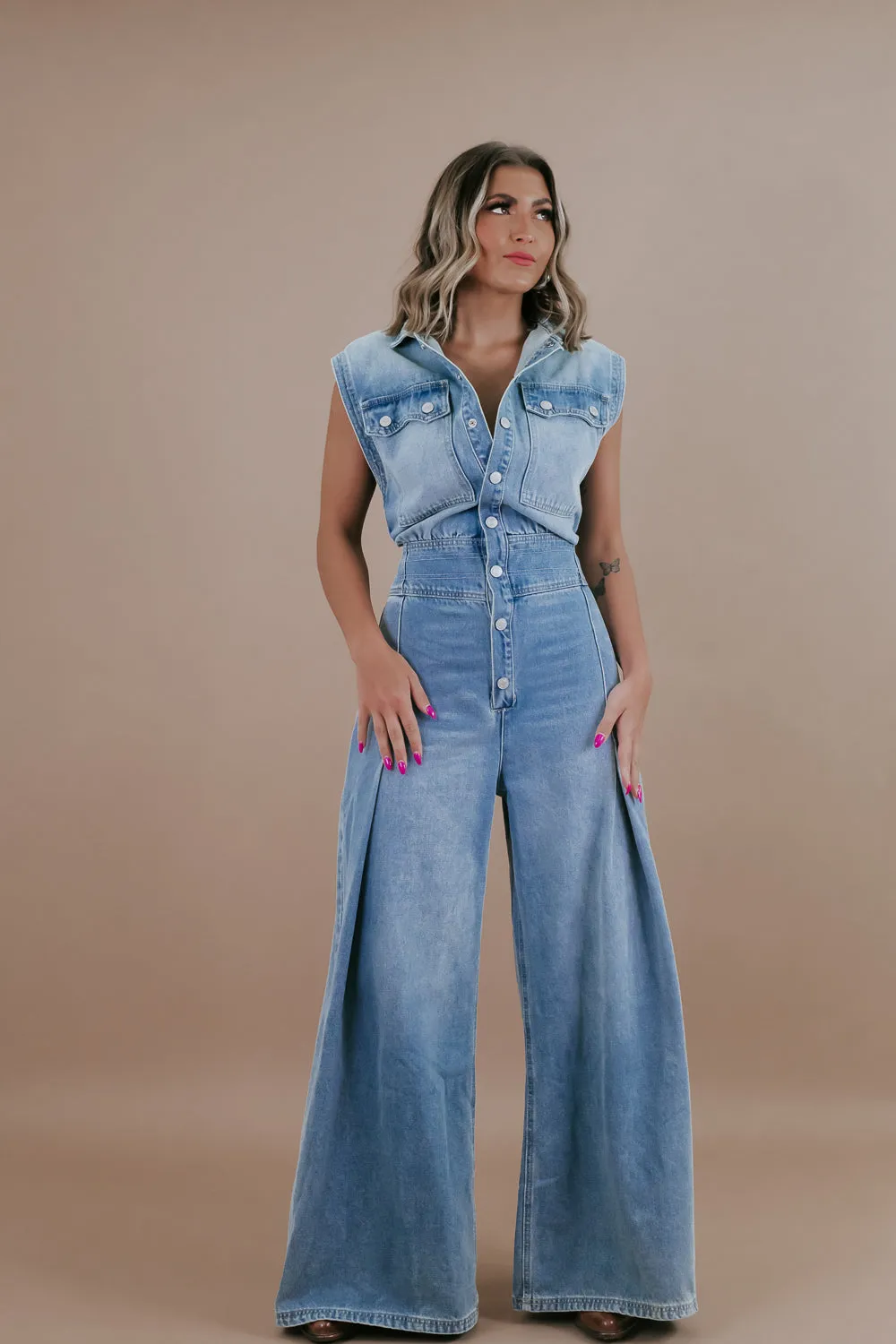 Doing The Most Denim Button Up Jumpsuit