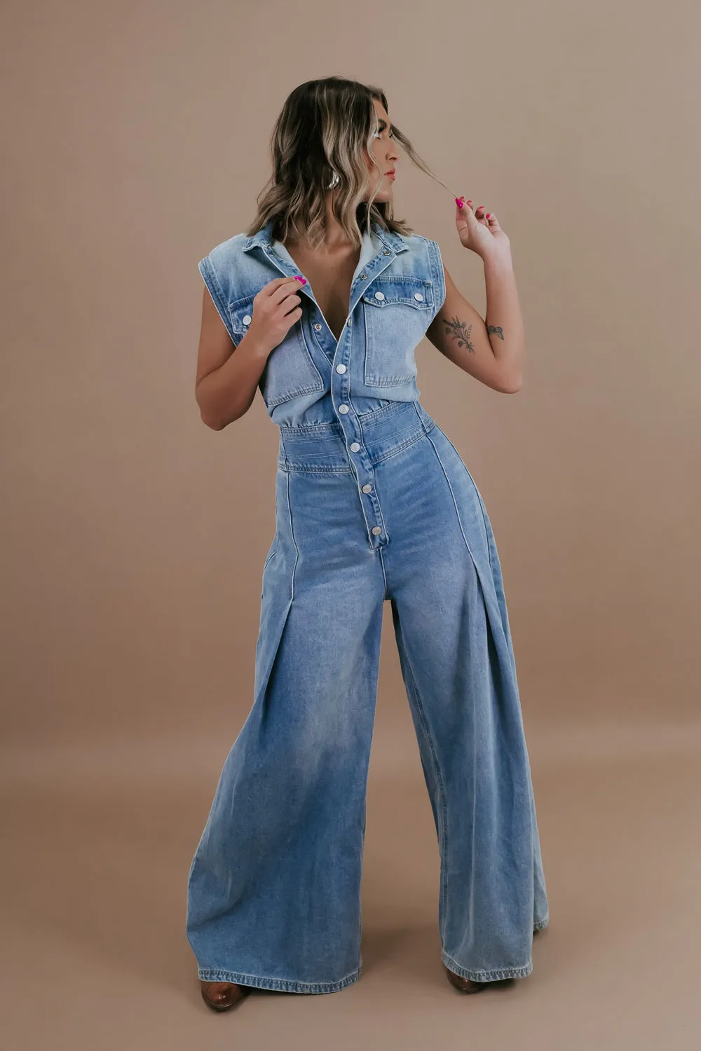 Doing The Most Denim Button Up Jumpsuit