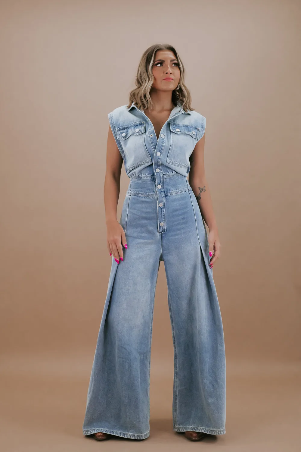 Doing The Most Denim Button Up Jumpsuit