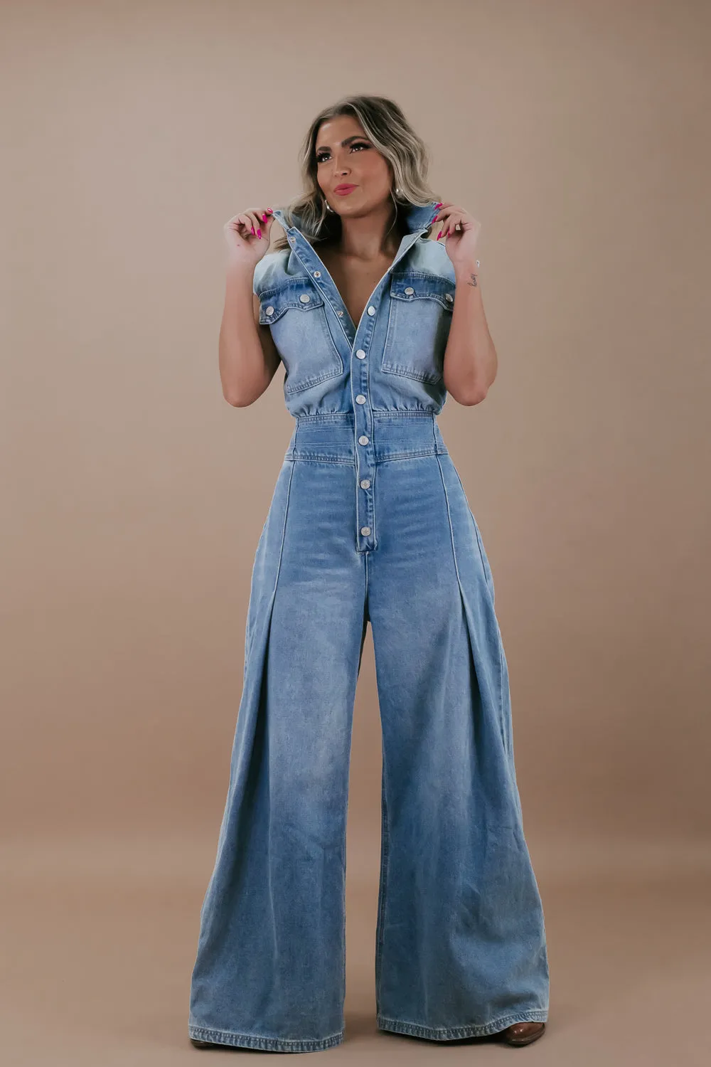 Doing The Most Denim Button Up Jumpsuit